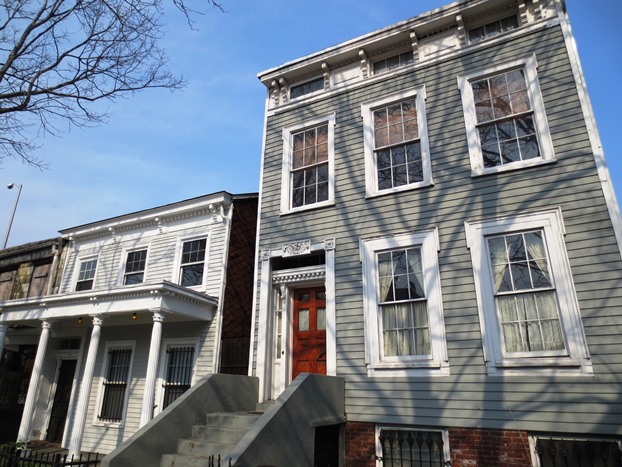 Woodframe homes in the Wallabout Historic District on Vanderbilt Avenue.  Image Credit: Myrtle Avenue Brooklyn Partnership